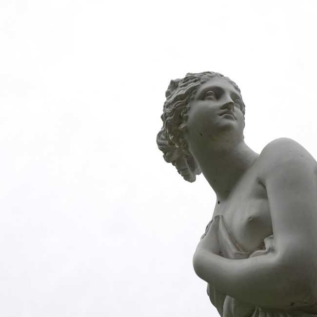 topless woman statue