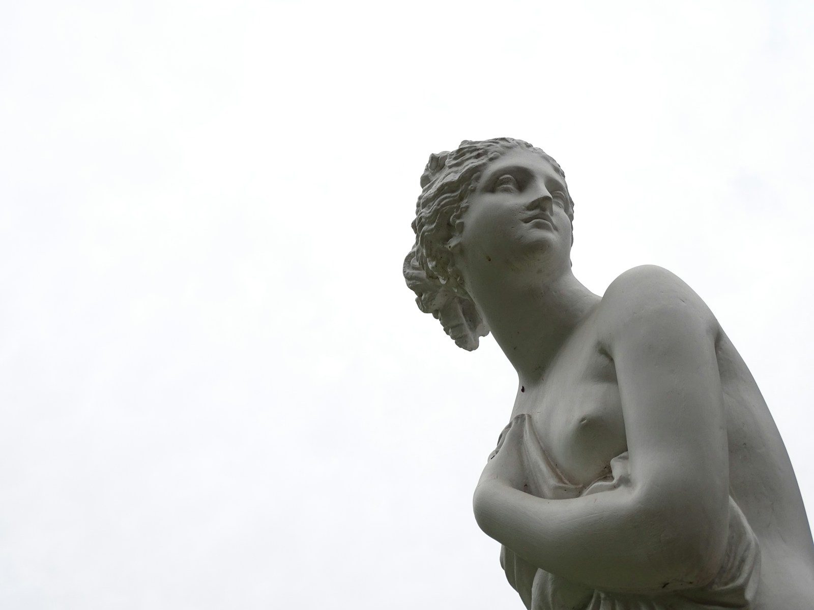 topless woman statue